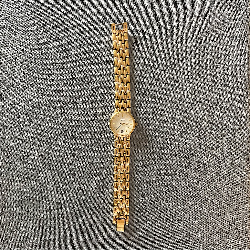 Anne Klein II gold plated watch w/calendar. 1/2”x 7”.Needs battery. timeless.